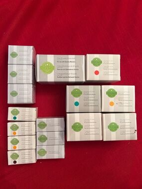 Scentsy Replacement Bulbs in White Boxes with Green Logos and Colored Dot Labels